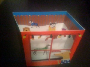 It's multi-layered with dogs on each level, very neat